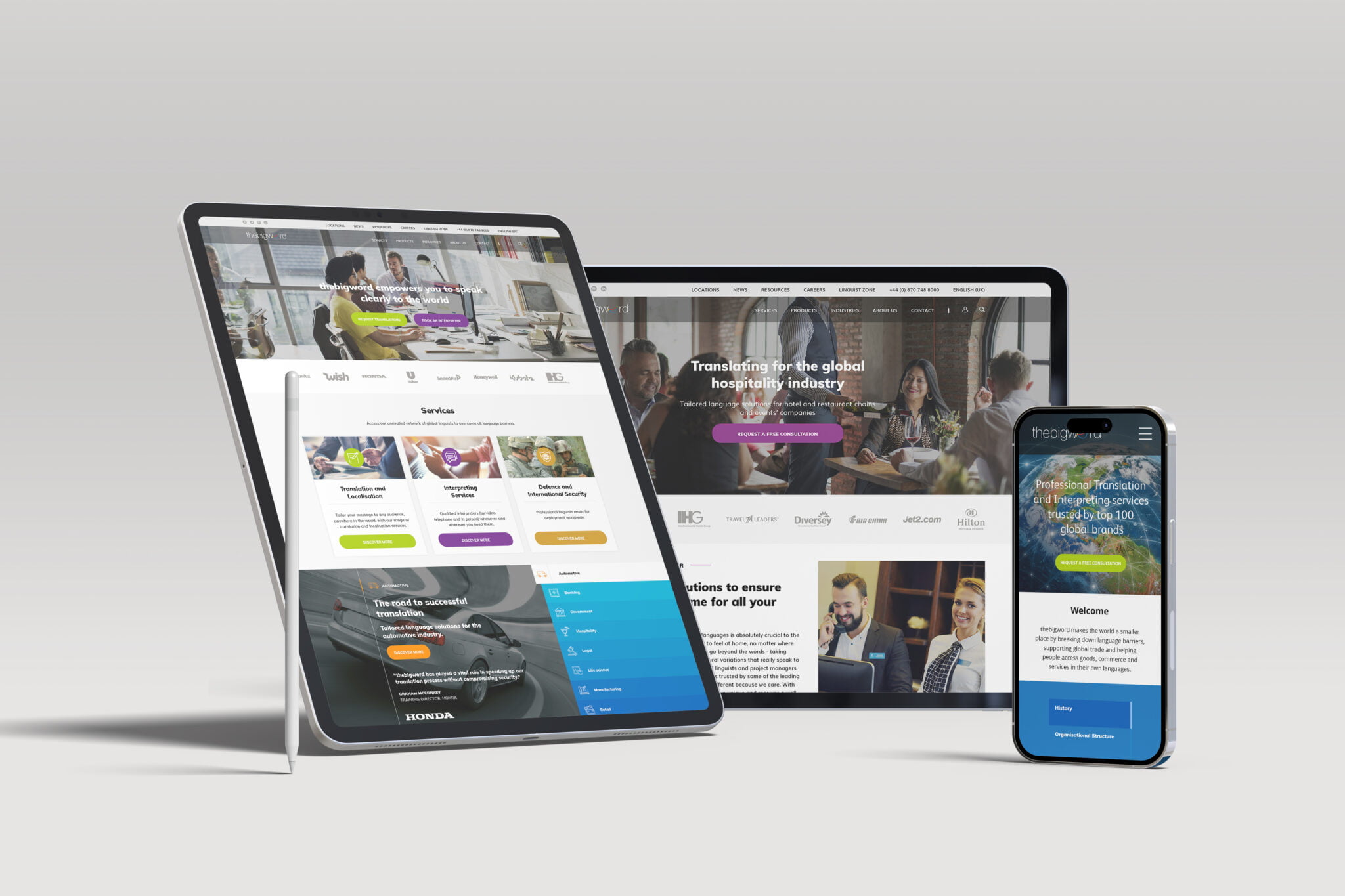 Thebigword's website design shown on a portrait iPad, a landscape iPad and an iPhone